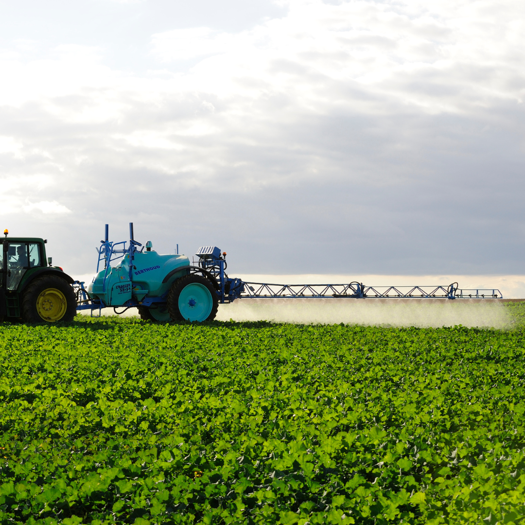 Berthoud Tracker trailed sprayer working in the field, equipped with an axial boom for uniform spraying.