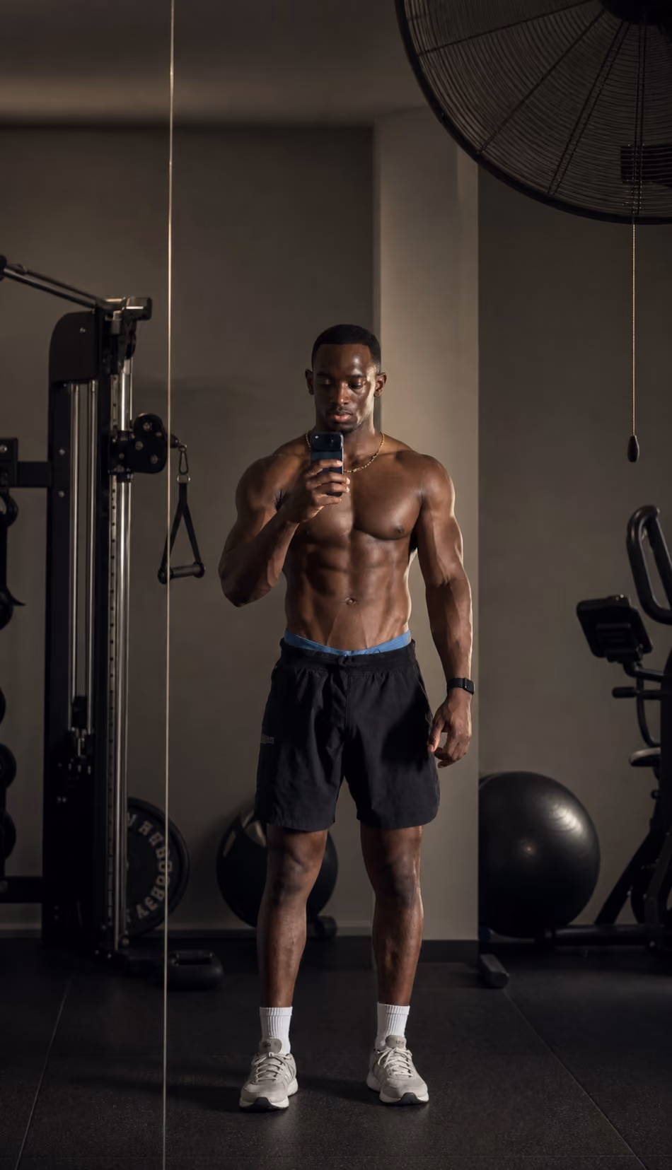 Illustrative after image of an athletic man in a private training studio