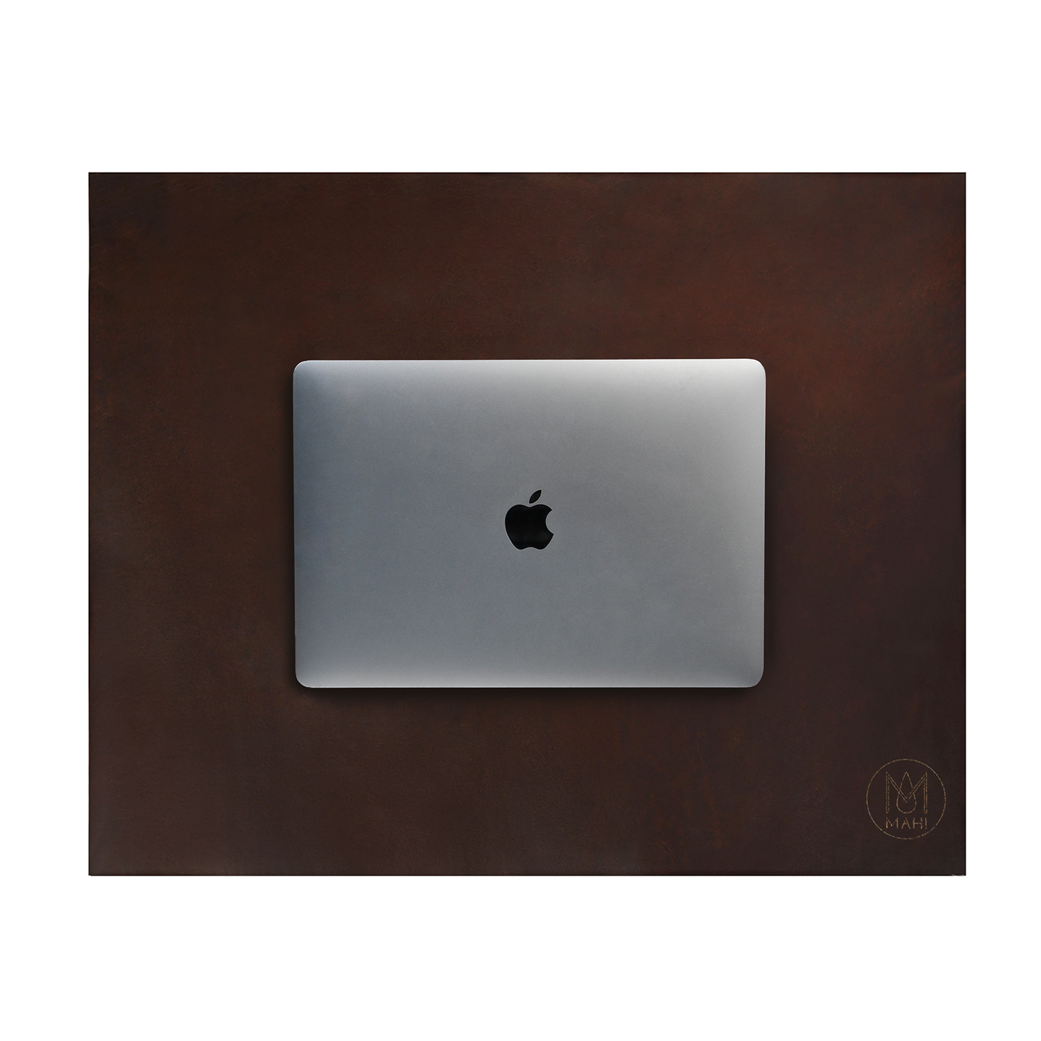 Top-down product image of a brown leather desk mat with a silver laptop