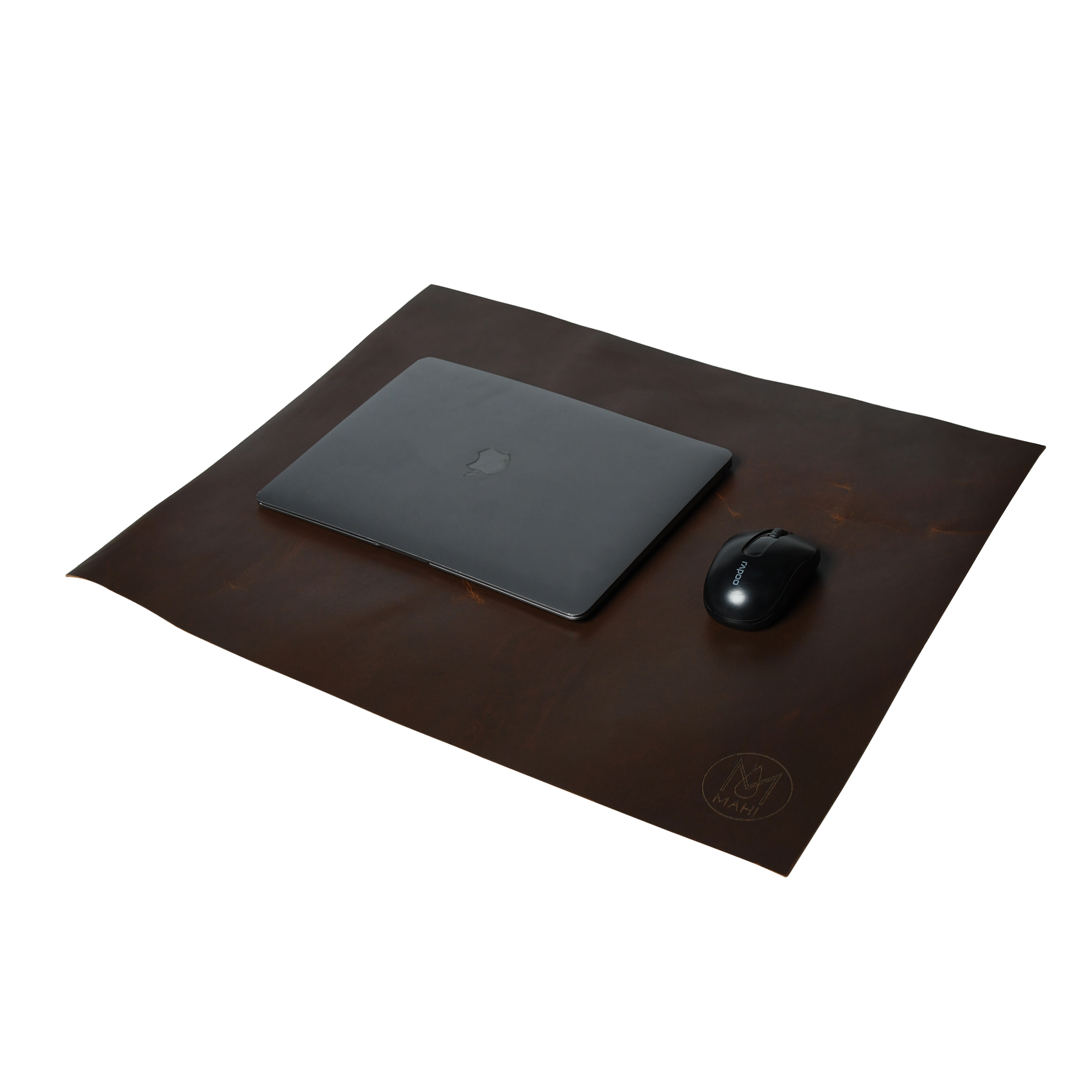 Desk setup with a brown leather desk mat, laptop and black mouse before retouching