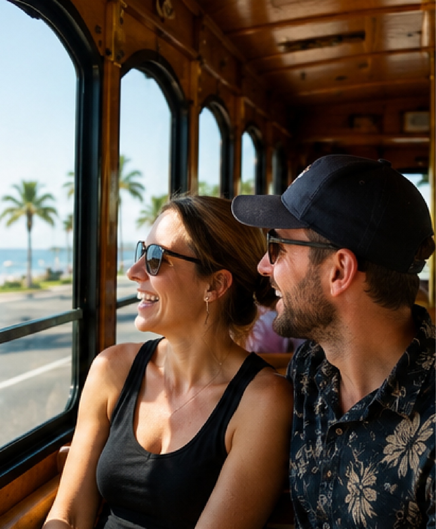 people looking out window of trolley