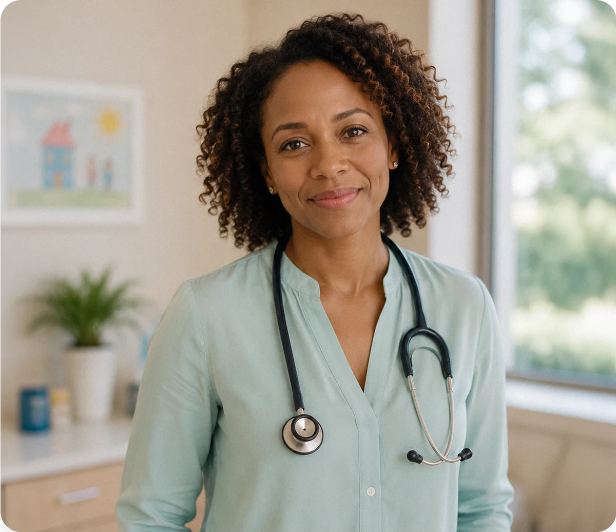 A doctor with an estetoscope looking directly to the camera