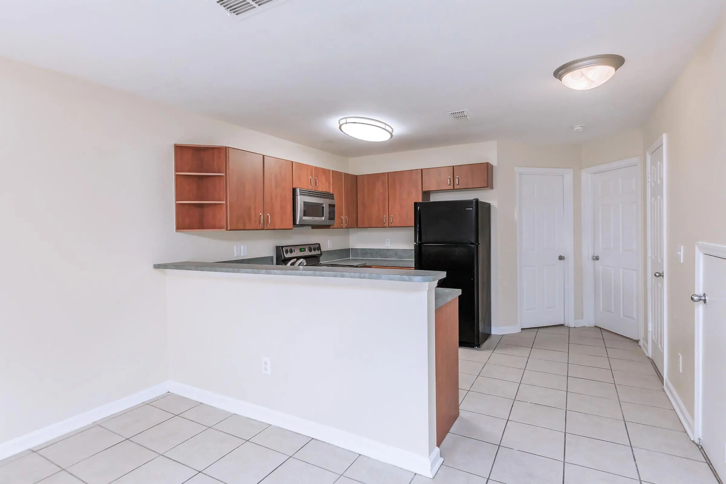 Kitchen with brown cabinets
