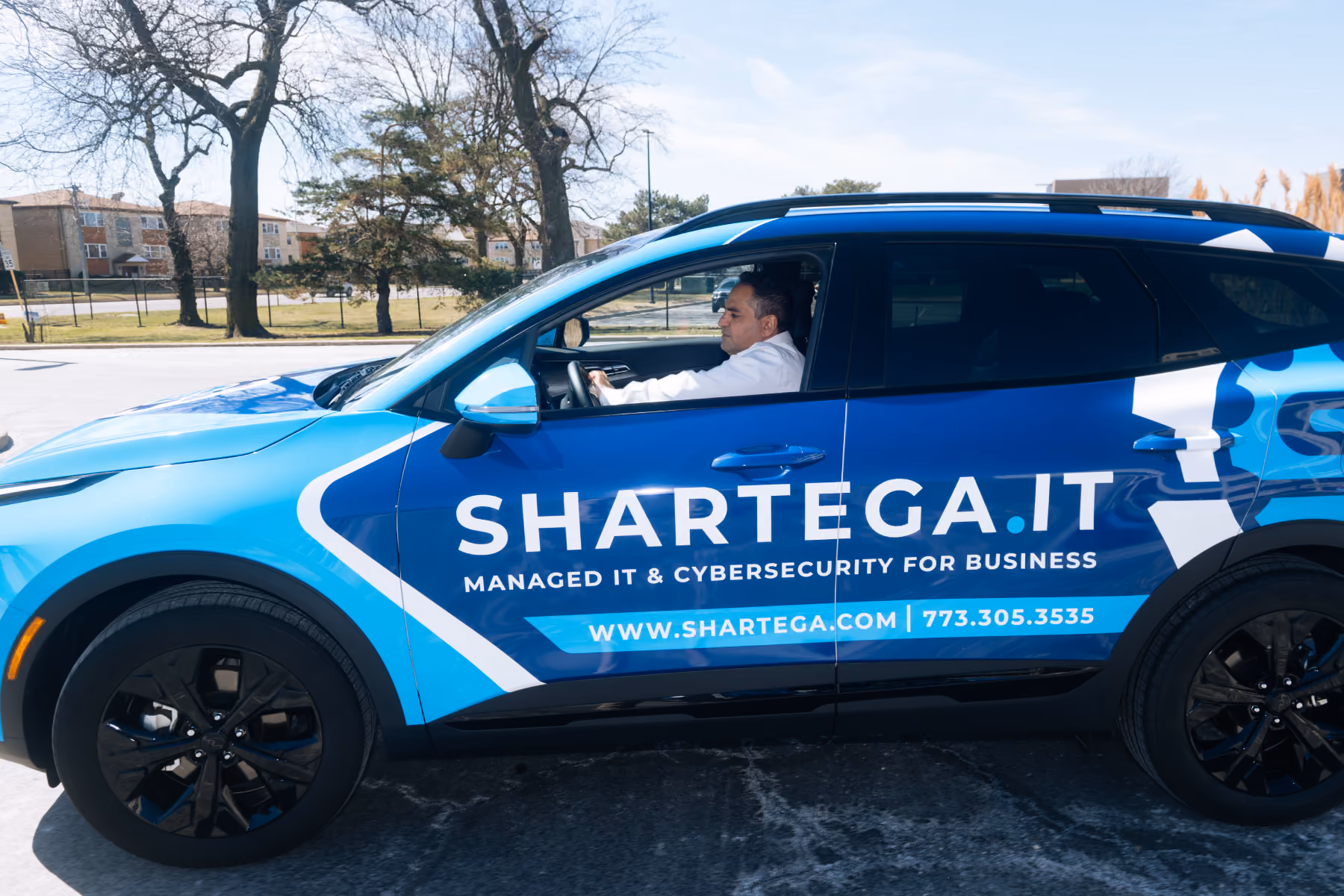 Branded Shartega IT service vehicle used for onsite support calls