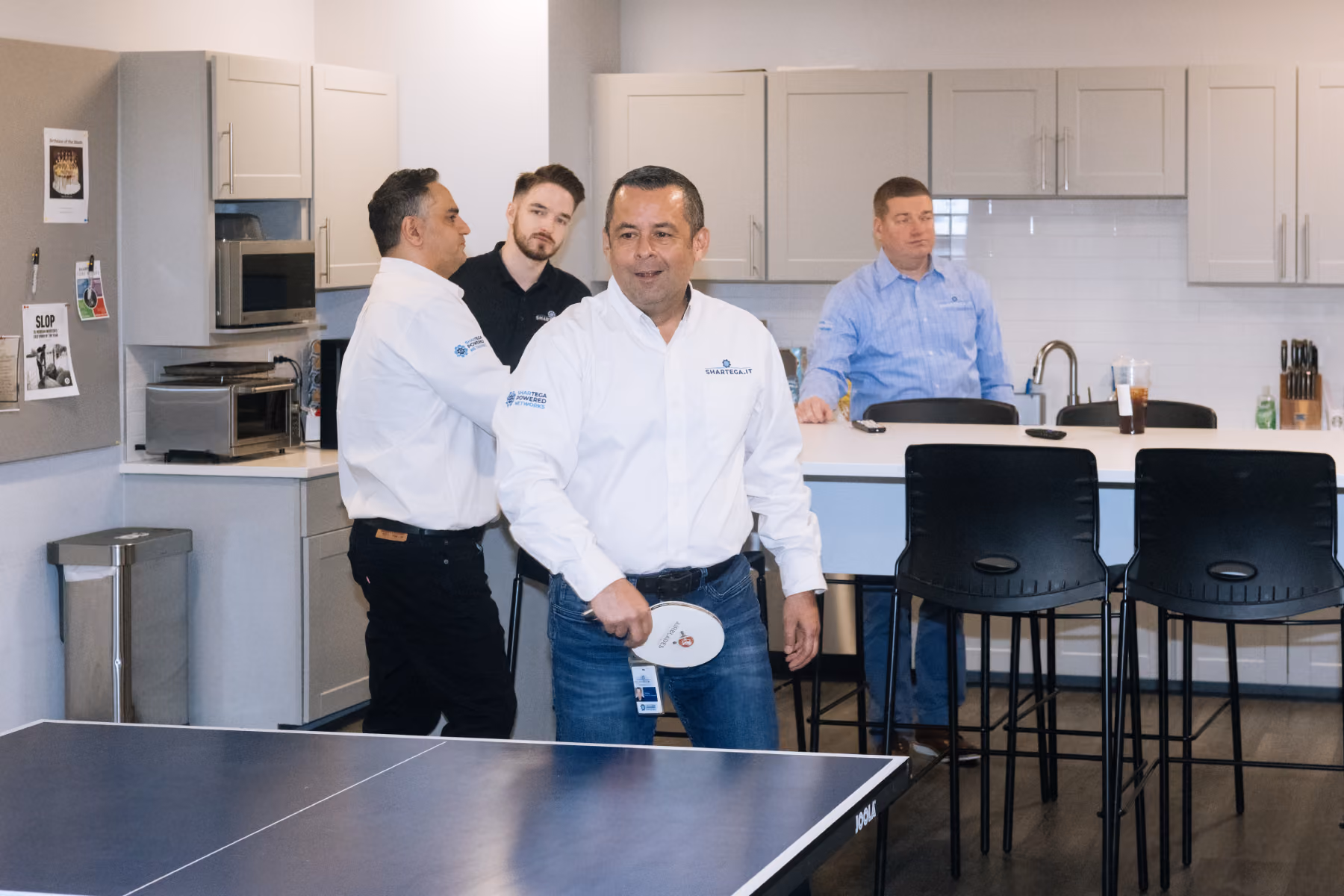 Shartega IT team in the office kitchen