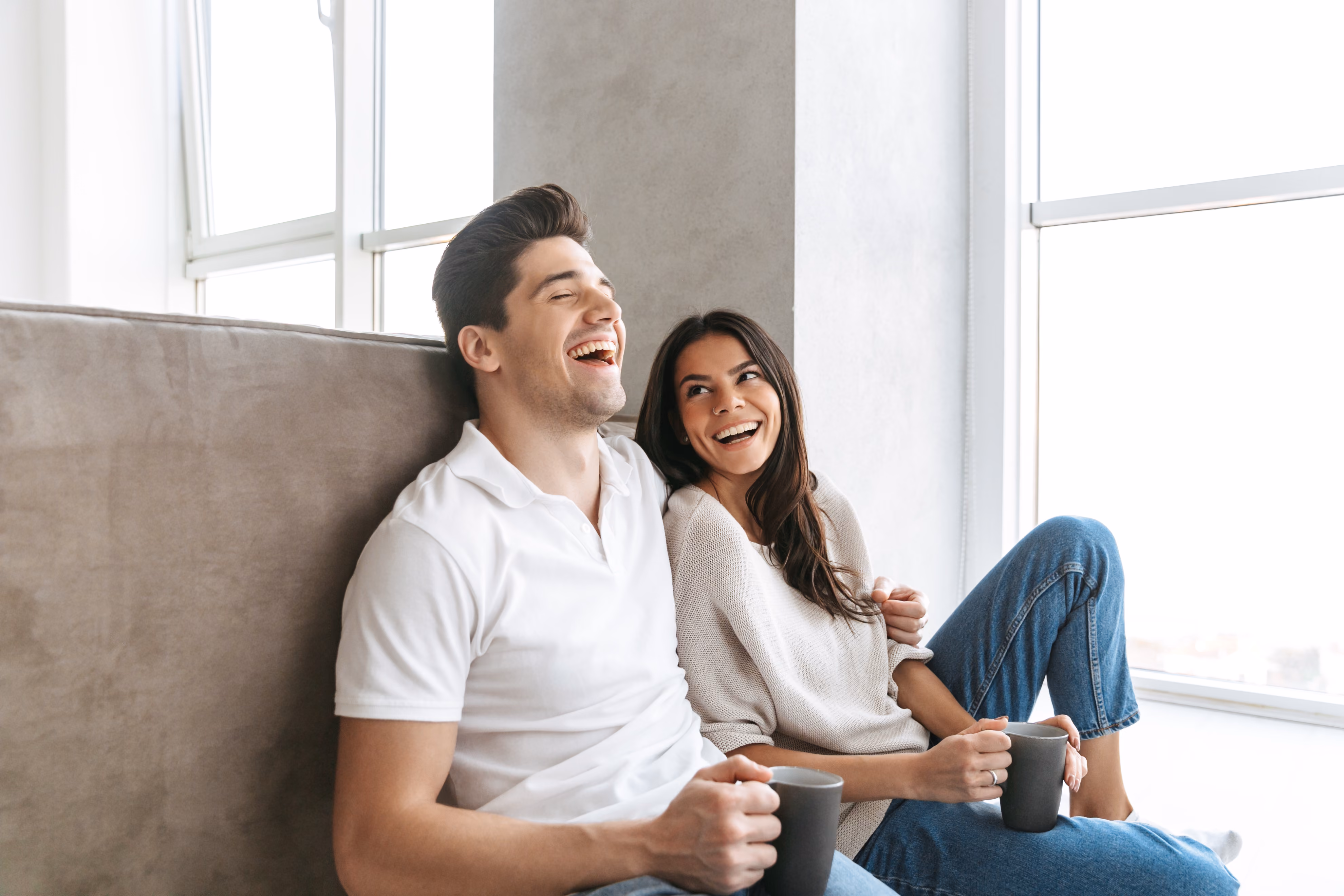 Man and woman sitting together stock image