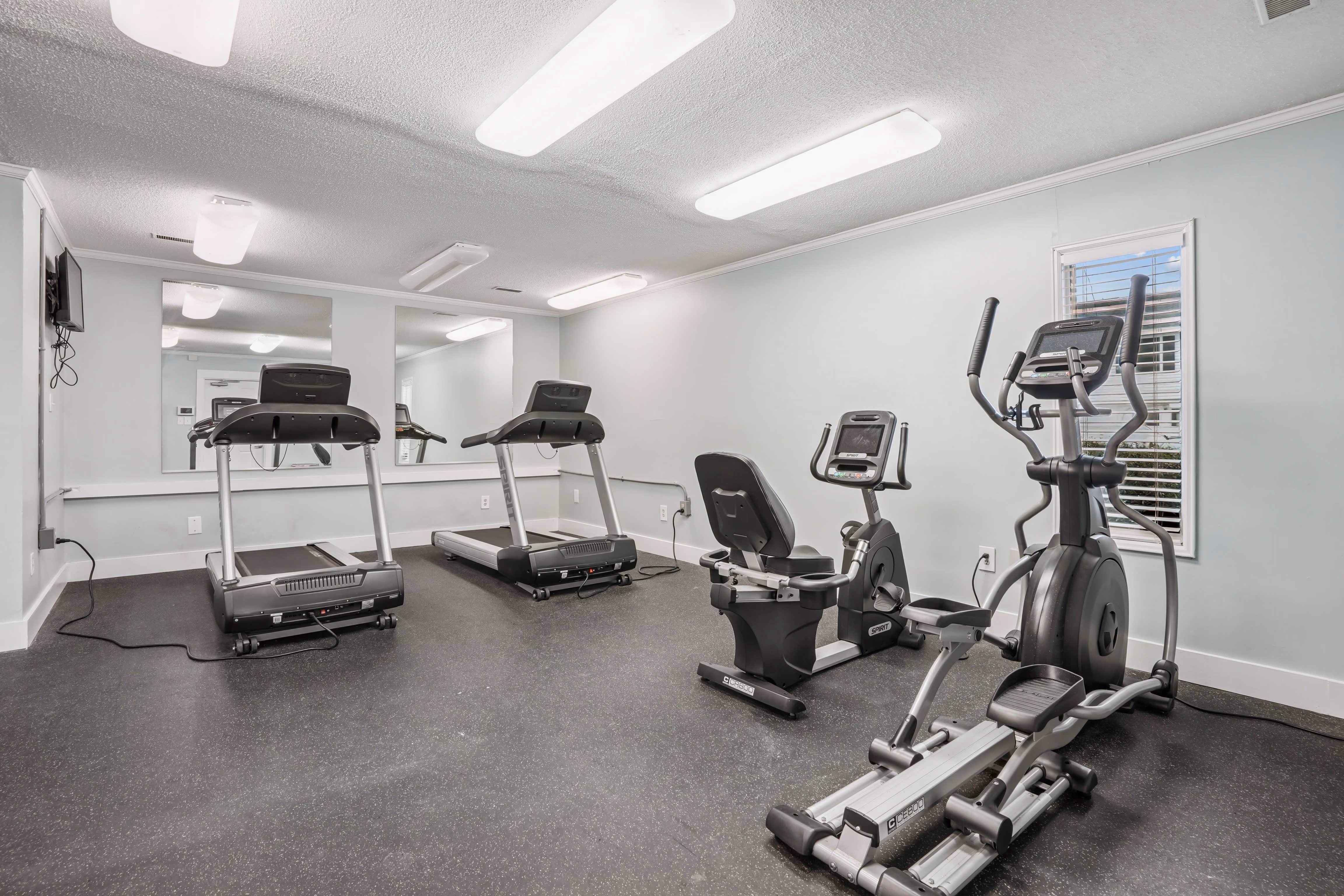 Fitness center with various cardio machines