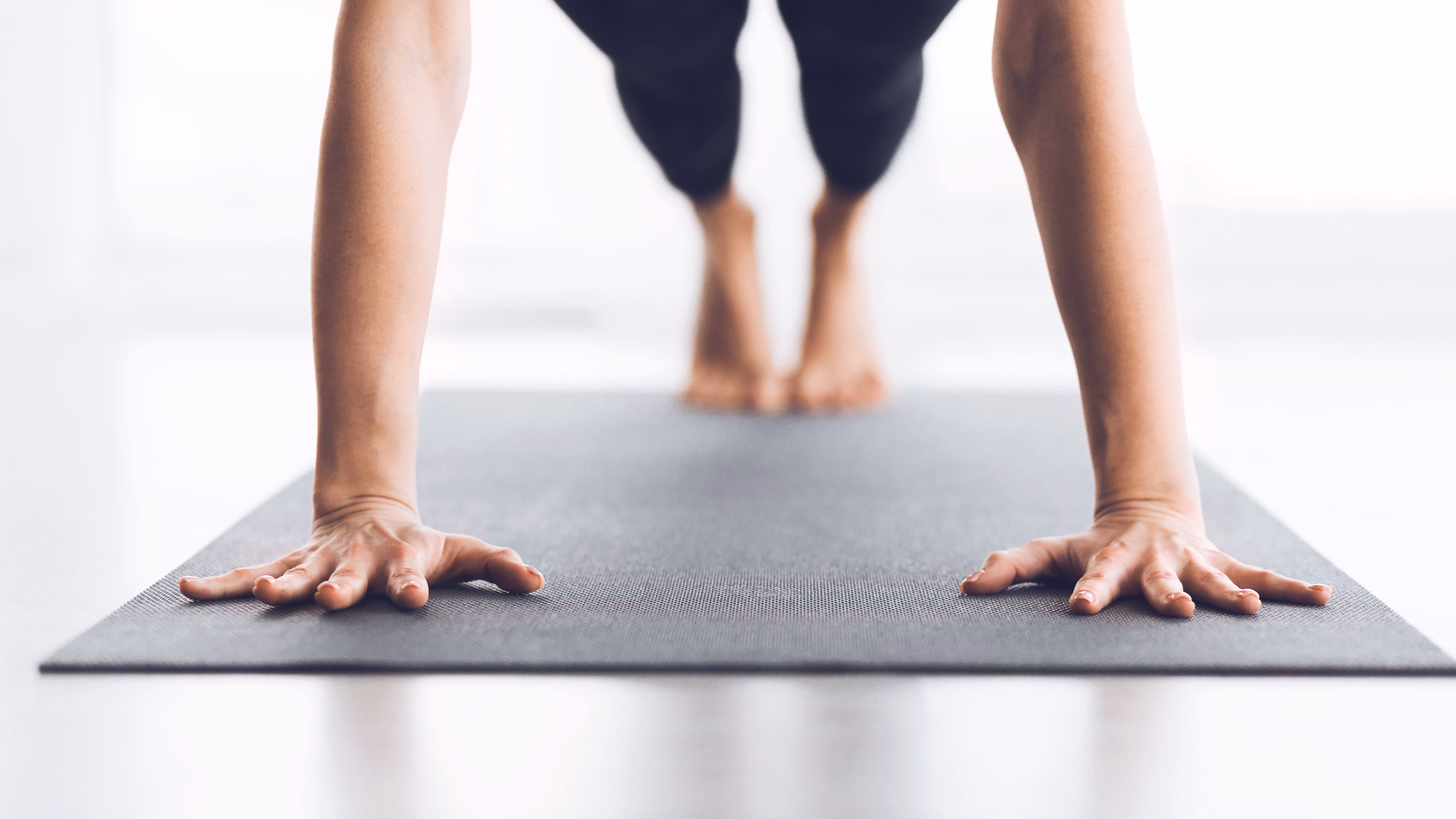 Woman doing a push up stock image