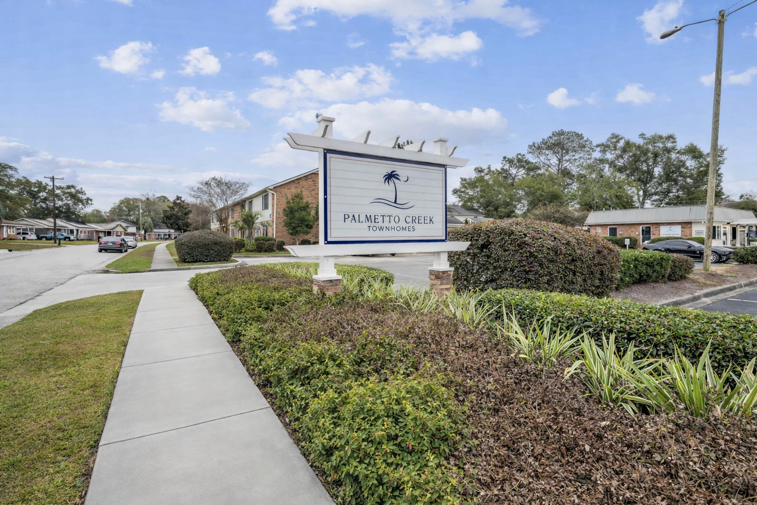 Sidewalk with property sign