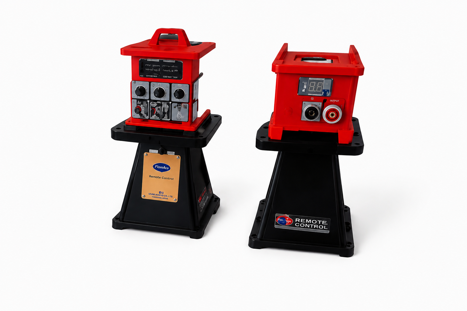 Two red and black power distribution boxes with multiple connected black cables on a white background.