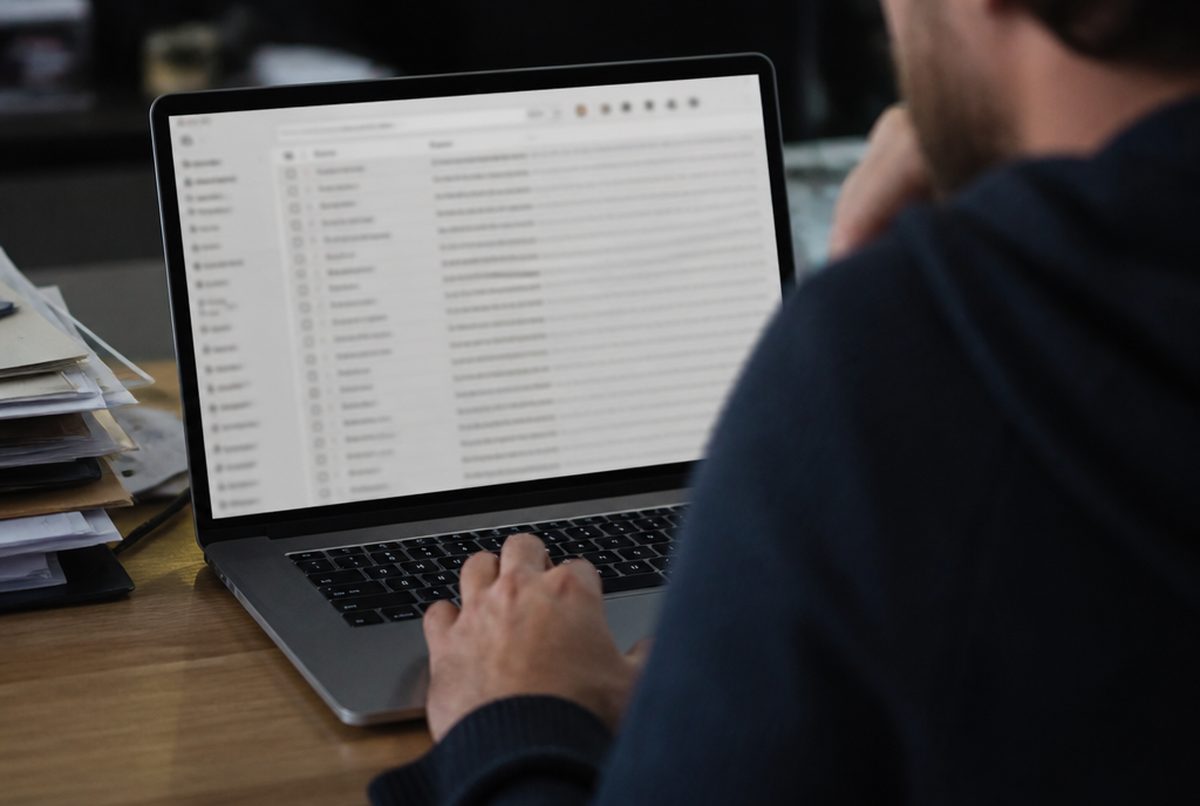 Laptop screen showing an overflowing email inbox