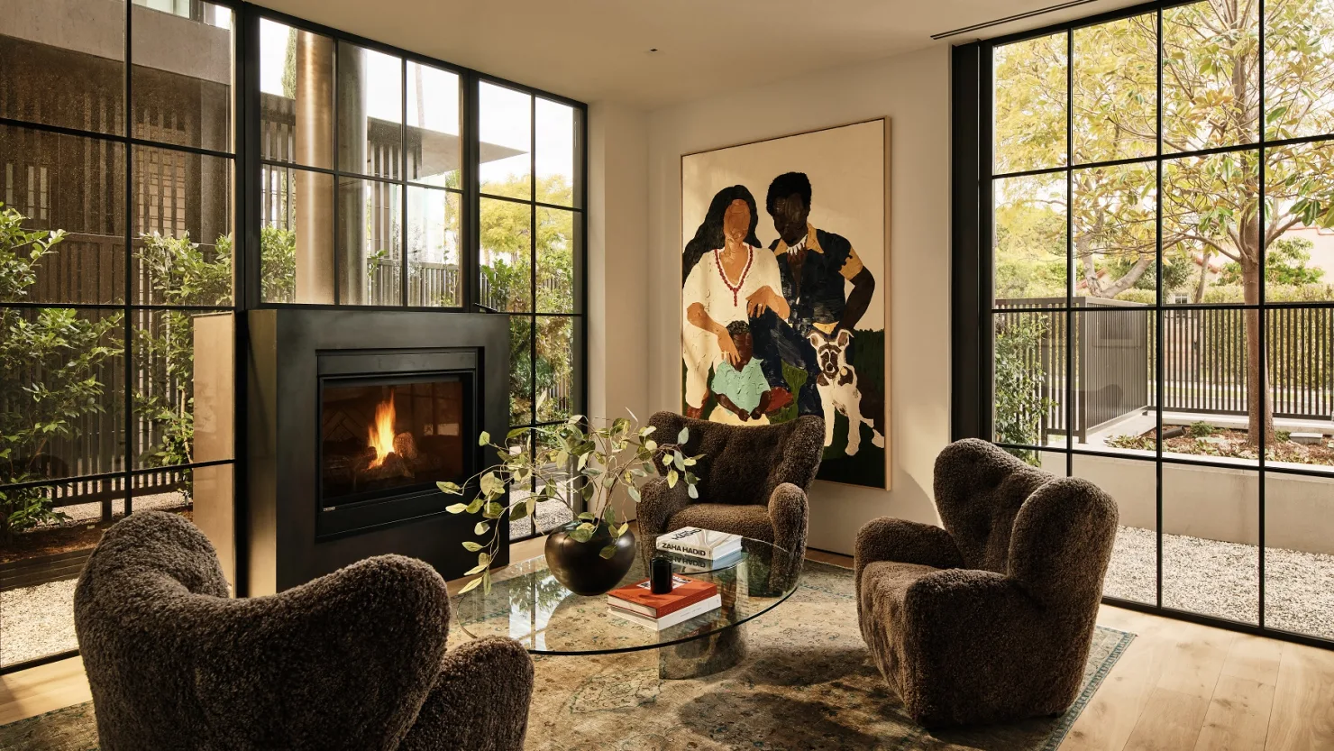 Living room at The Houses at 8899 Beverly with a large figurative painting