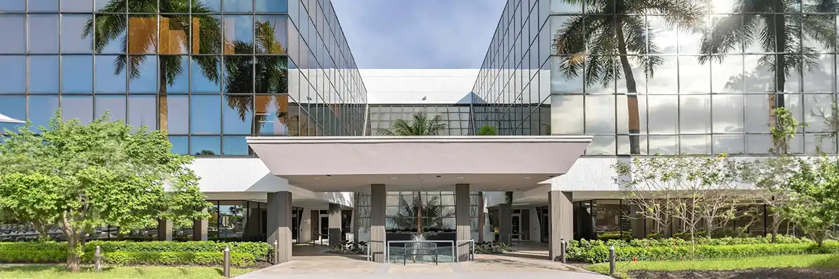 Commercial office building with palm trees in South Florida