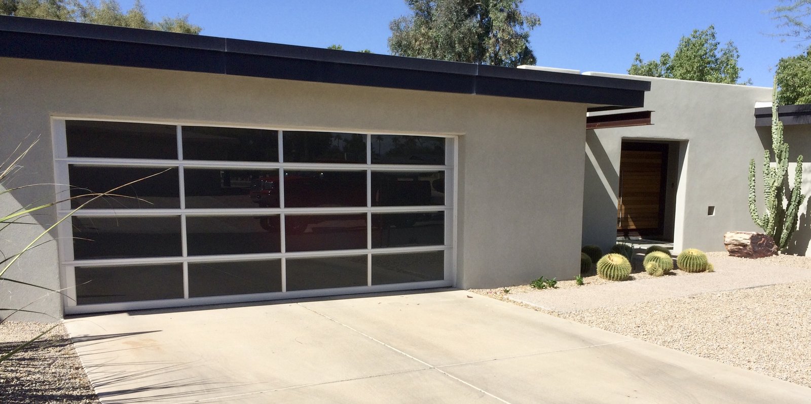 Modern full view glass and aluminium garage door