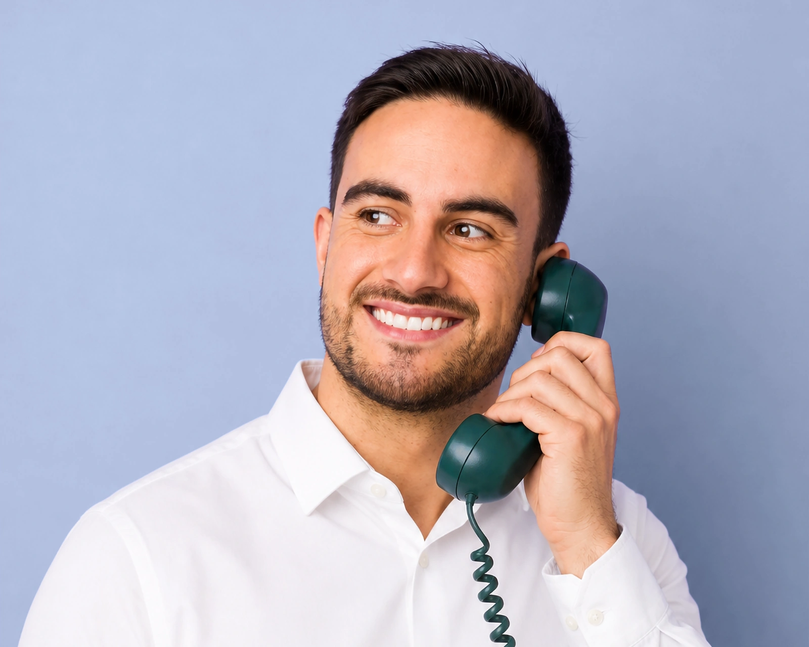 Smiling business owner talking on the phone with a financial adviser from The Loan Supply Company