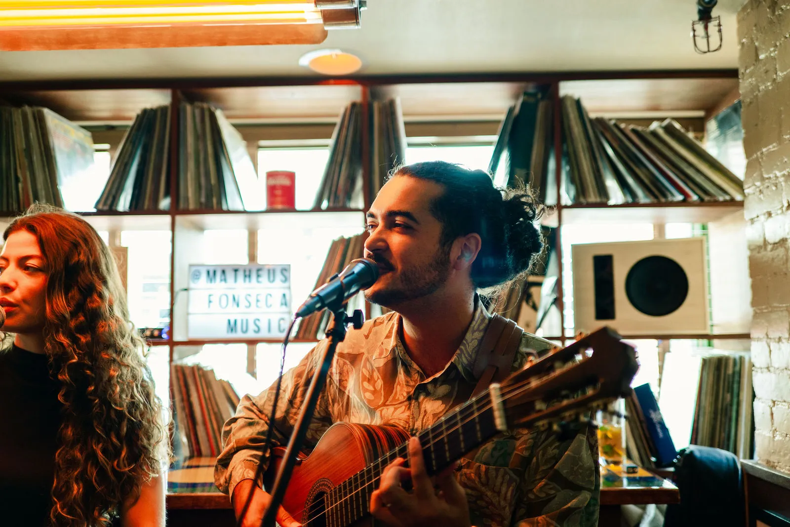 Matheus Fonseca performing with guitar at CANA