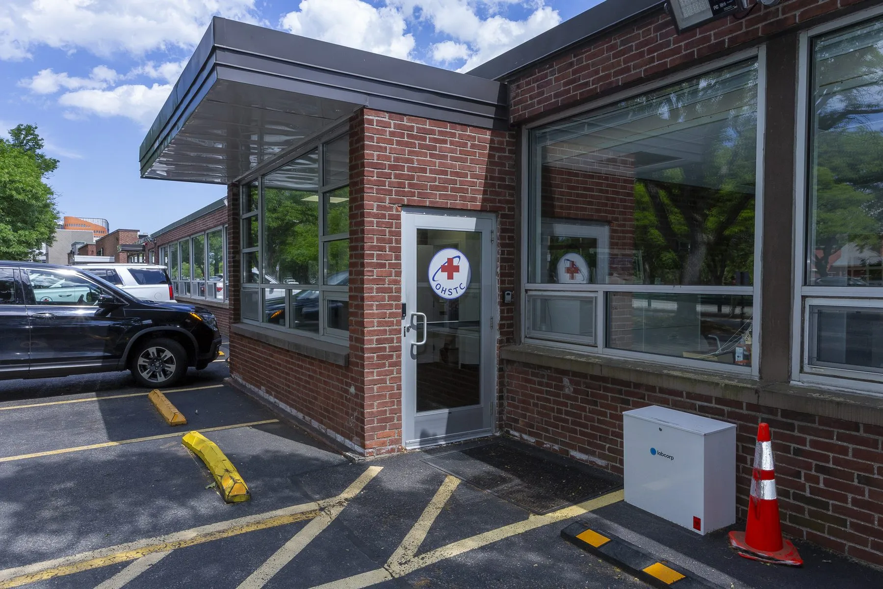 Entrance to the OHS Total Care clinic building in Brighton
