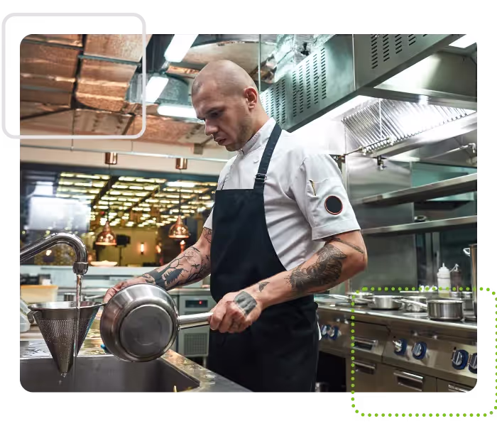 Man preparing food in commercial kitchen