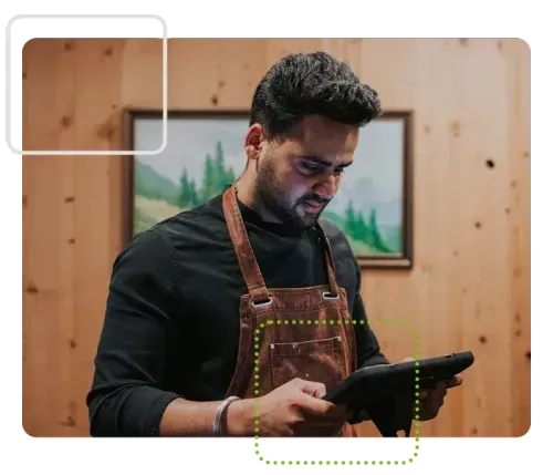 Chef using iPad with Safe Food Pro