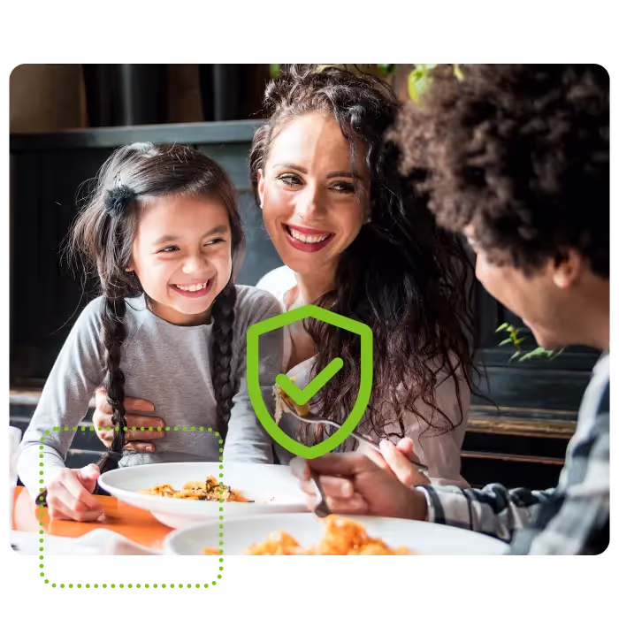 Family enjoying meal out together
