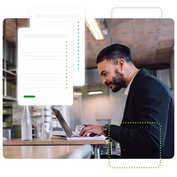 Man working on desktop at restaurant