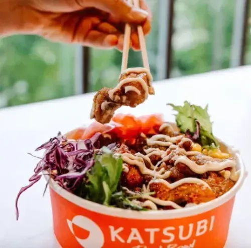 Somebody eating from a Katsubi Red Bowl