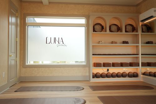 a yoga class setting in a minimalist studio