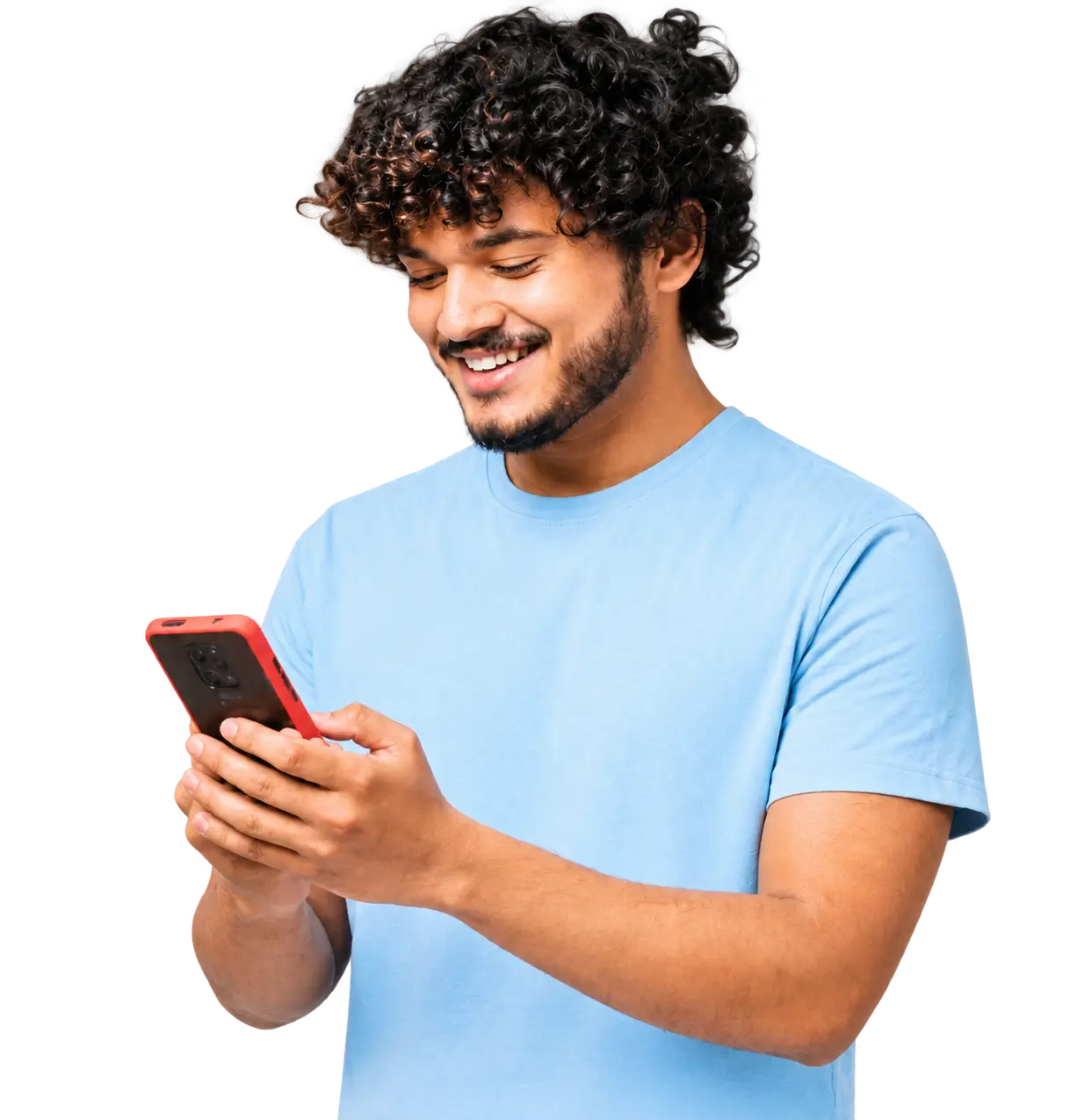 Smiling man with curly hair wearing light blue shirt holding a red smartphone, looking at its screen.