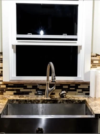 Mosaic kitchen backsplash with tone blended across the run, installed by Euphoric Tile & Design in coastal Maine