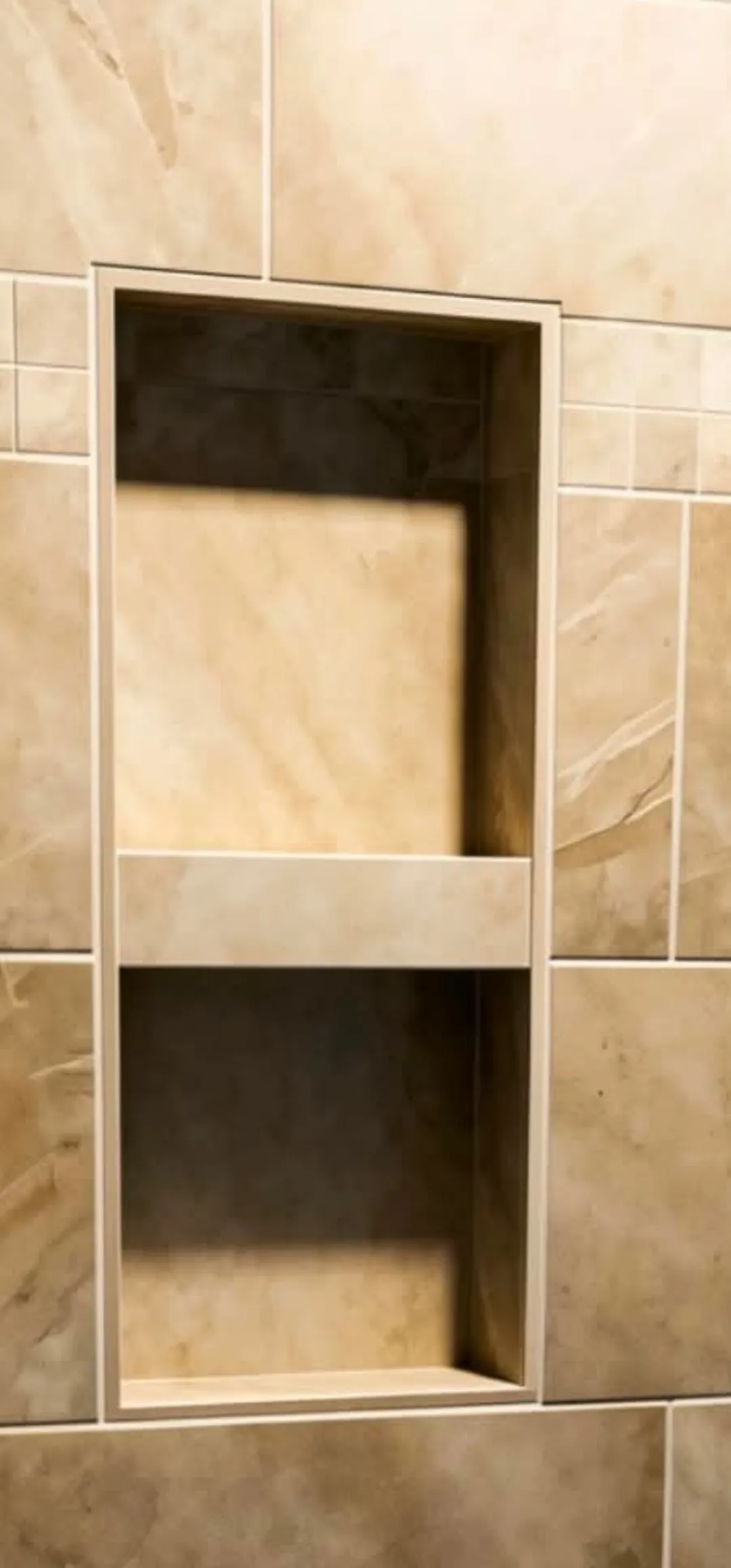 Twin shower niche trimmed square in stone-look porcelain, installed by Euphoric Tile & Design in coastal Maine
