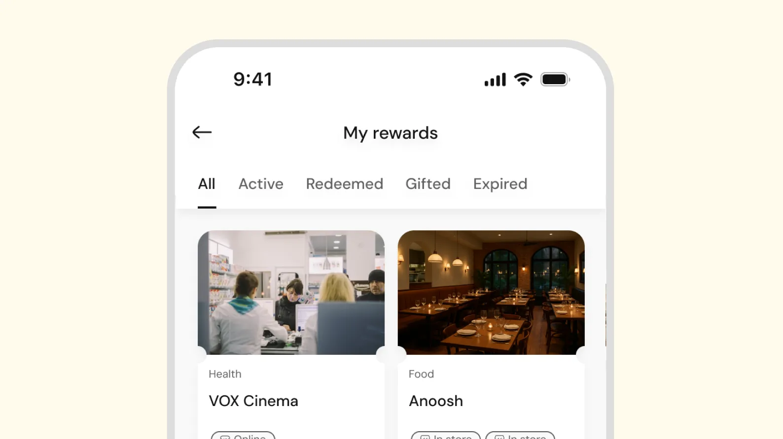 Mobile app screen showing rewards tabs with VOX Cinema and Anoosh dining offers.