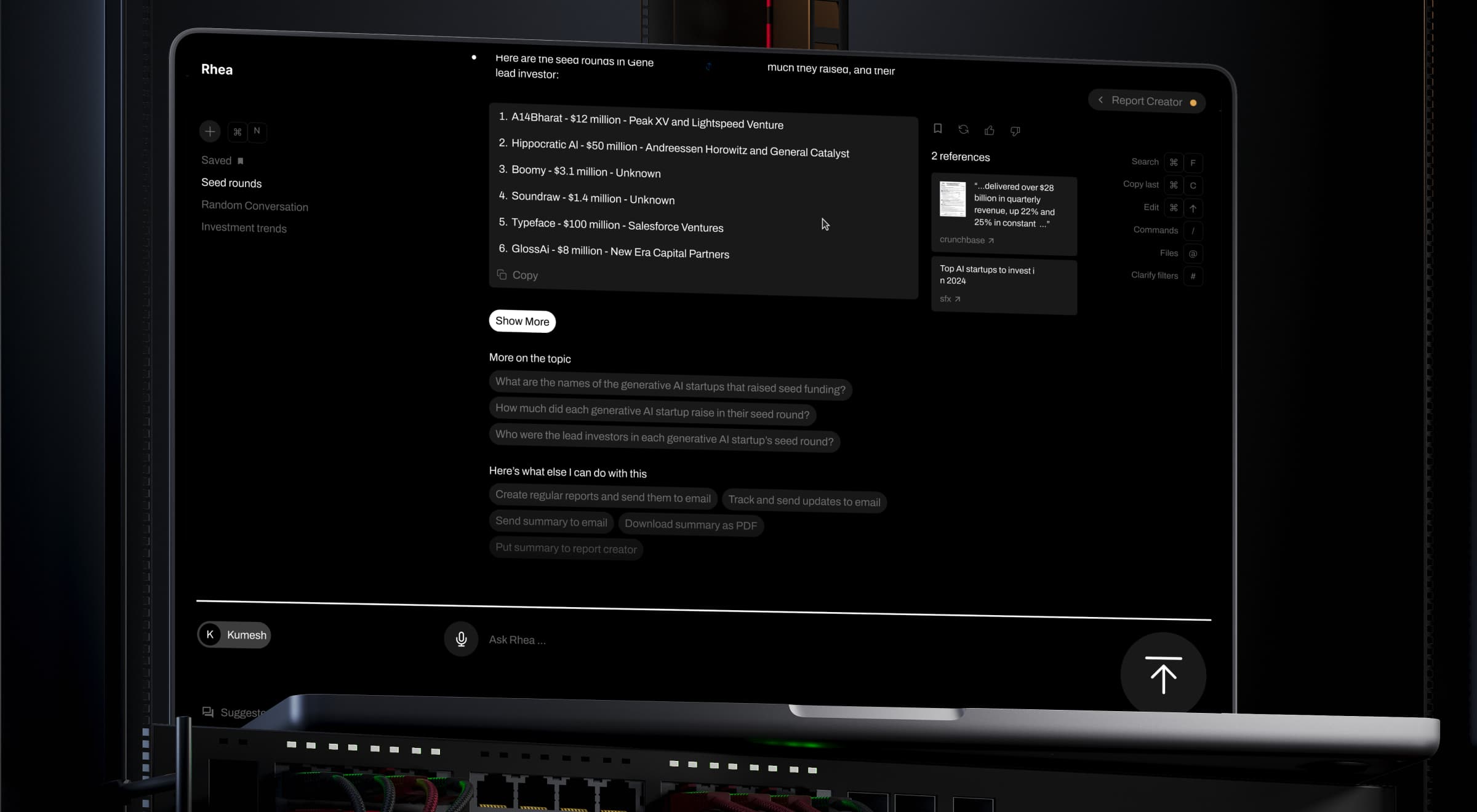 Laptop displaying an AI-powered financial research platform with conversational analysis, startup investment data, source references, and report generation tools in a dark interface.