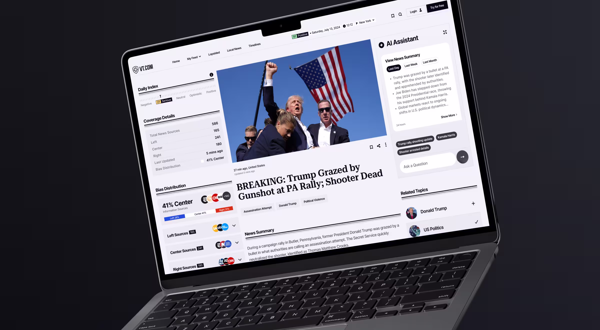 Laptop displaying VT.com news dashboard with AI assistant, bias analysis charts, and breaking news headline about Trump grazed by gunshot at a PA rally
