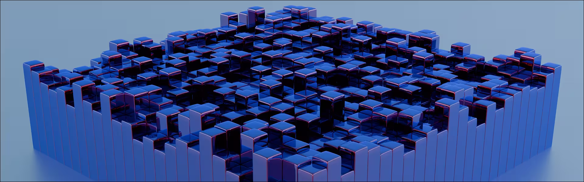 Abstract 3D composition of reflective cubes forming a structured grid, evoking data systems, modular architecture, and scalable digital infrastructure