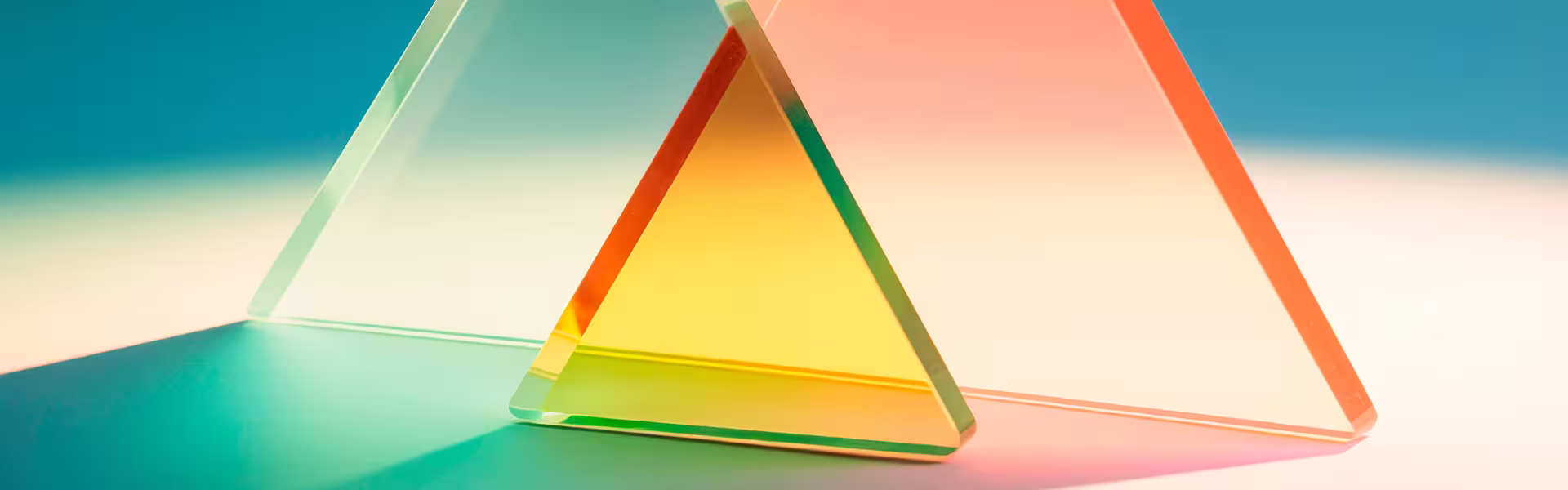 A visual metaphor for balancing competing priorities in product development, using geometric forms to introduce the trade-offs between speed, quality, and cost.