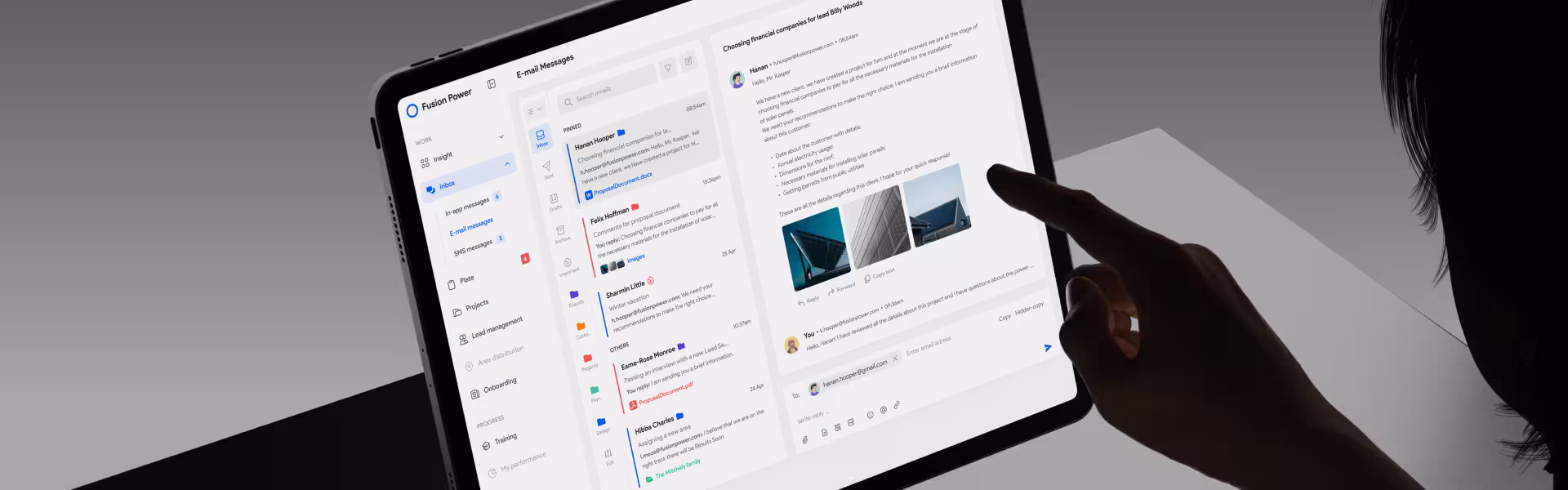 Person using a modern email dashboard UI on a tablet, showing a clean minimal interface with categorized messages and attachments
