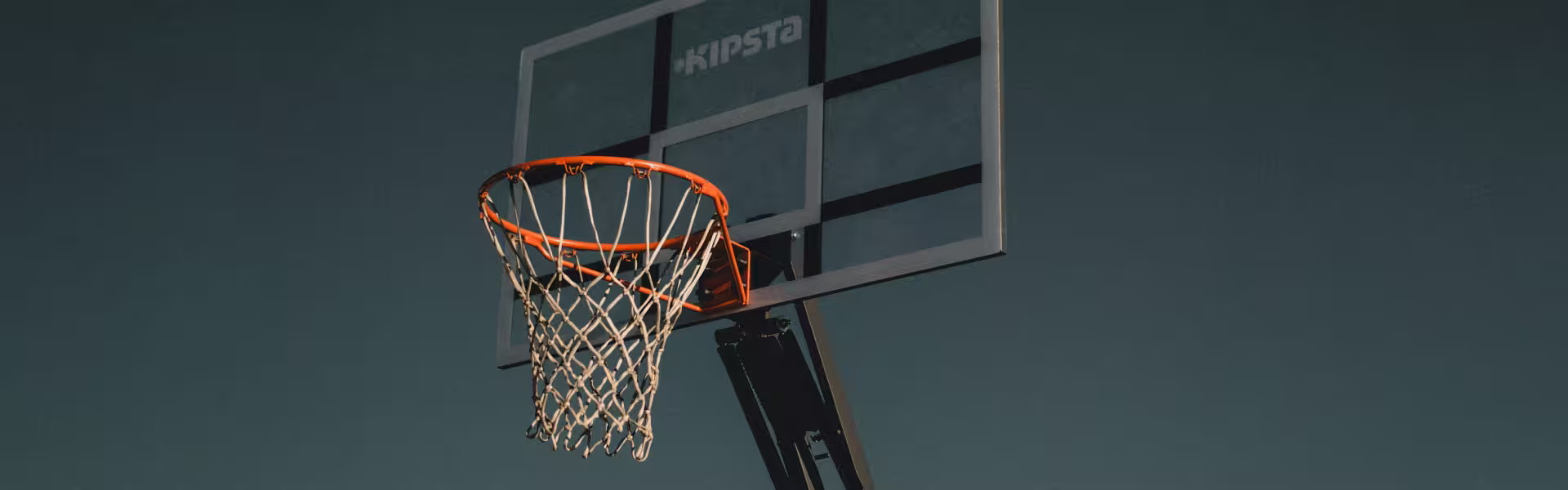 Basketball hoop symbolizing precision, performance, and achieving goals.