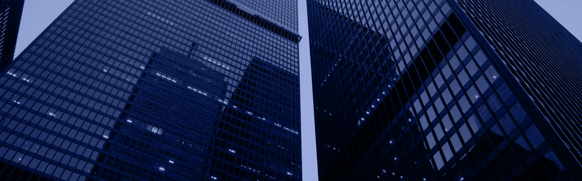 Buildings on a dark blue background.