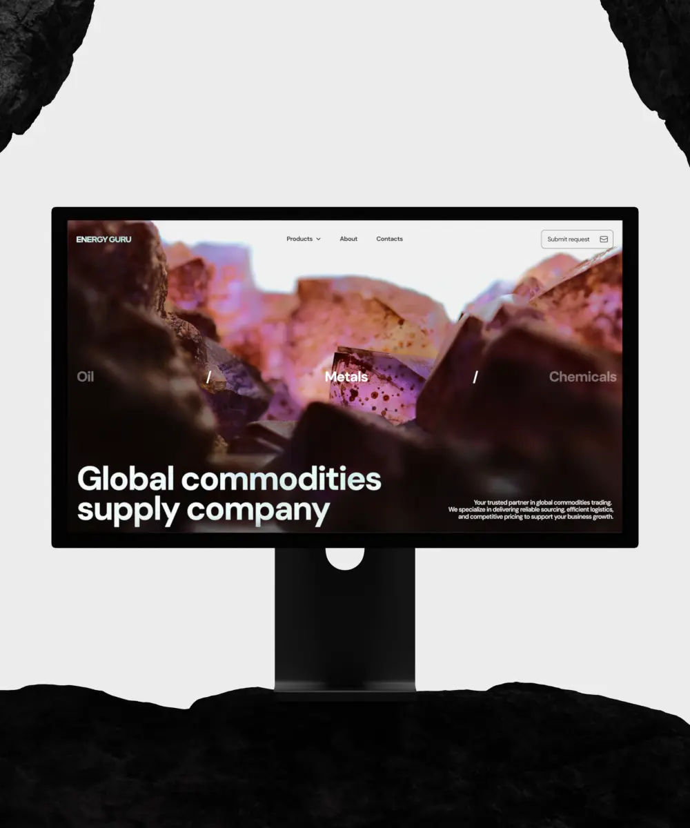 Monitor mockup between dark rock forms showing a commodities-supply website homepage headlined "Global commodities supply company."