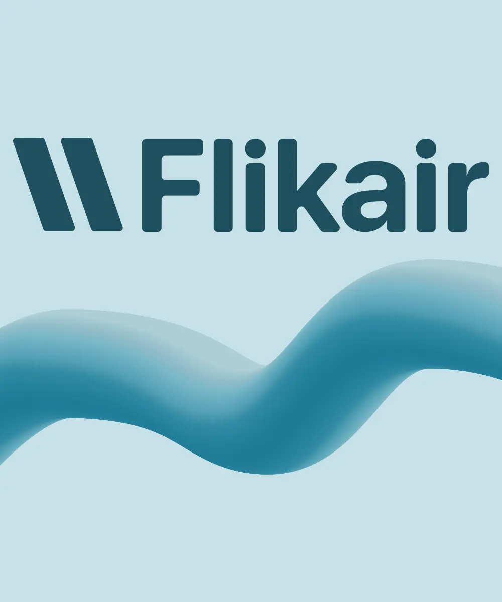 Flikair logo displayed on a light blue background, featuring a stylized double-chevron mark and a flowing wave graphic.