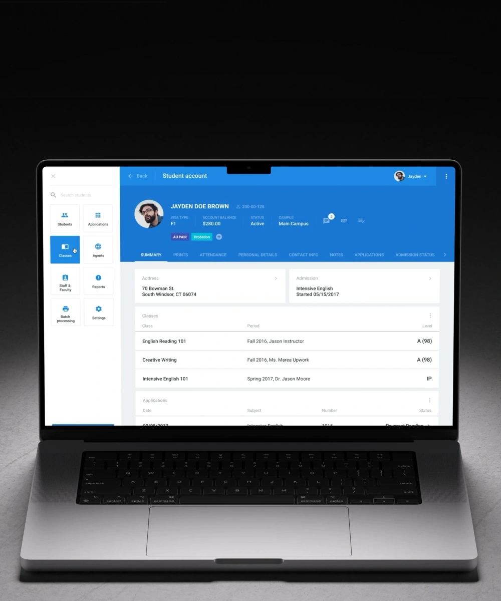 Campus AXESS student account summary open on a laptop, with visa type, account balance, status, and campus pinned in a header above the student's address, admission, class grades, and applications.