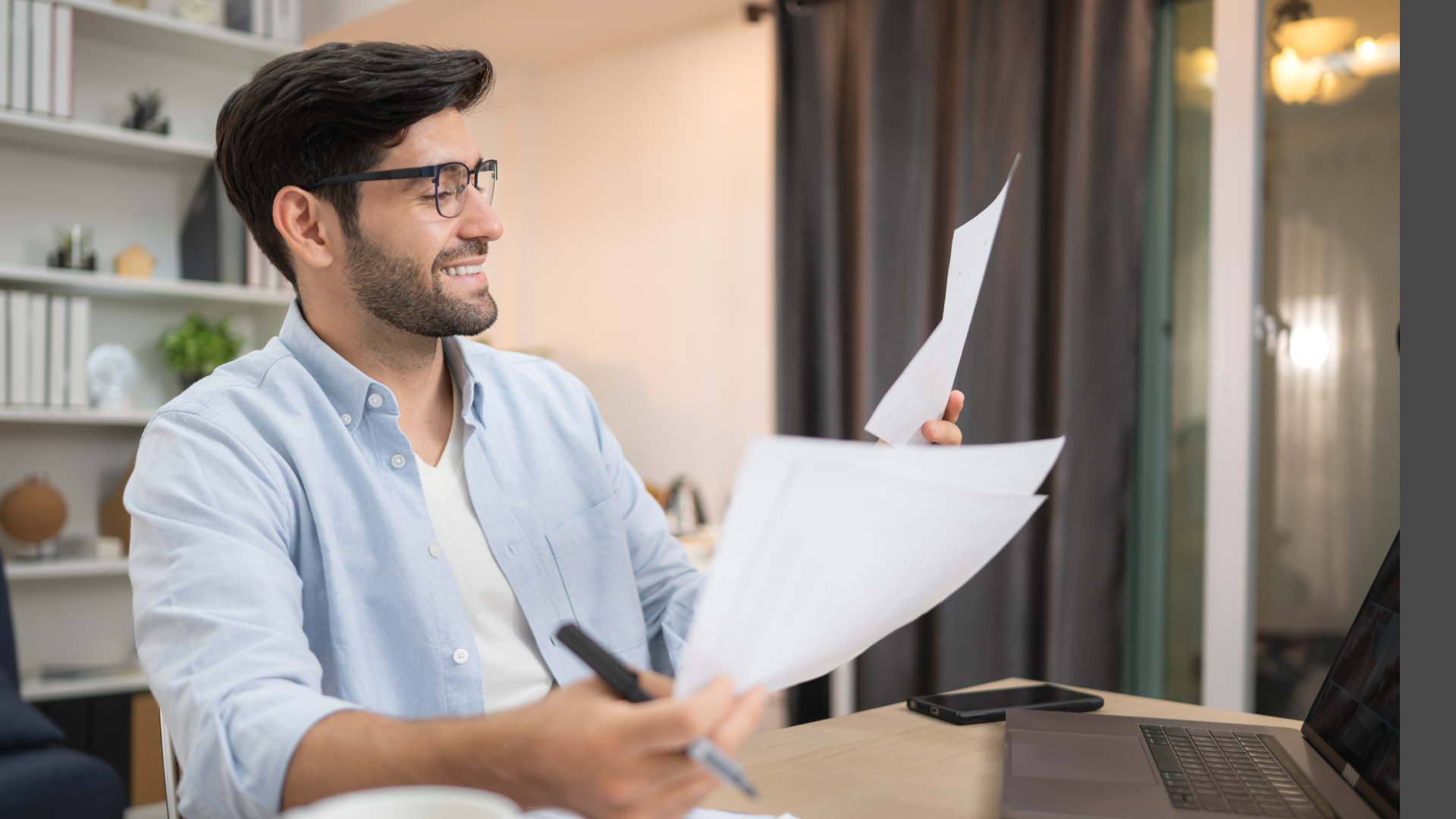 Professional reviewing documents to measure true trade promotion ROI