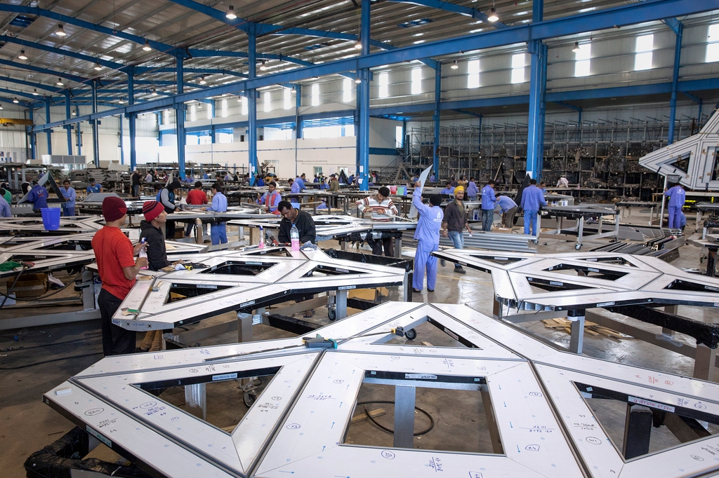 Aluminium stars being assembled at the factory