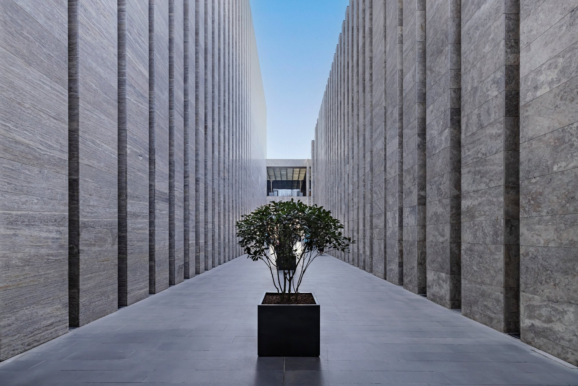 Stone-clad passage with vertical fins at the Atatürk Cultural Center, Istanbul