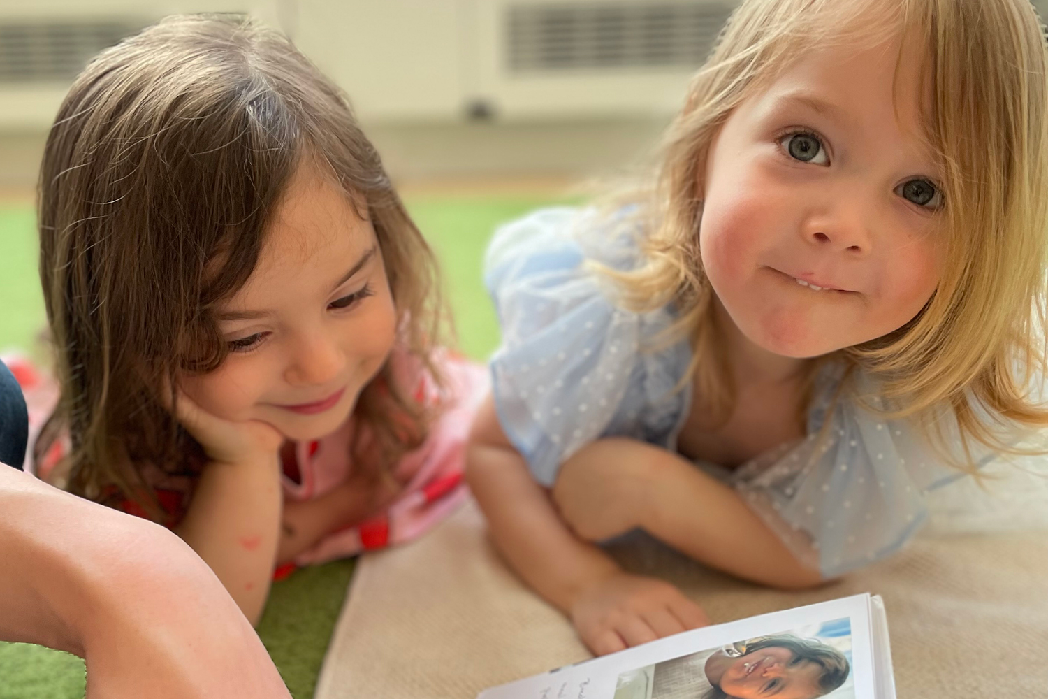 Nursery students in a classroom reading moment at Pine Street School