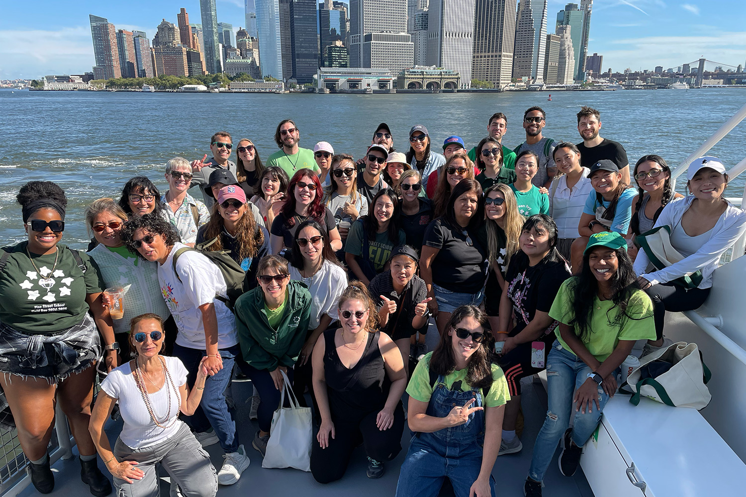 Image of Pine Street School faculty and staff on a ferry excursion in NYC.