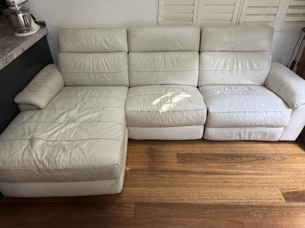 Before and after leather cleaning by Mega Clean