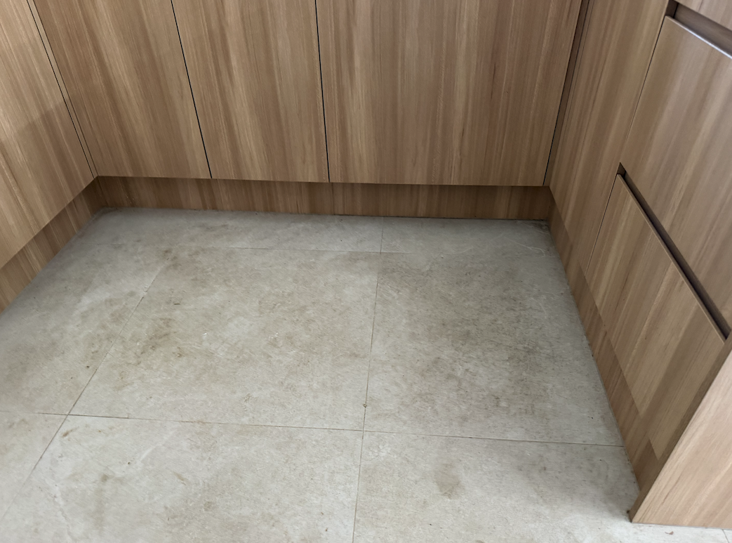 Before and after grout cleaning by Mega Clean