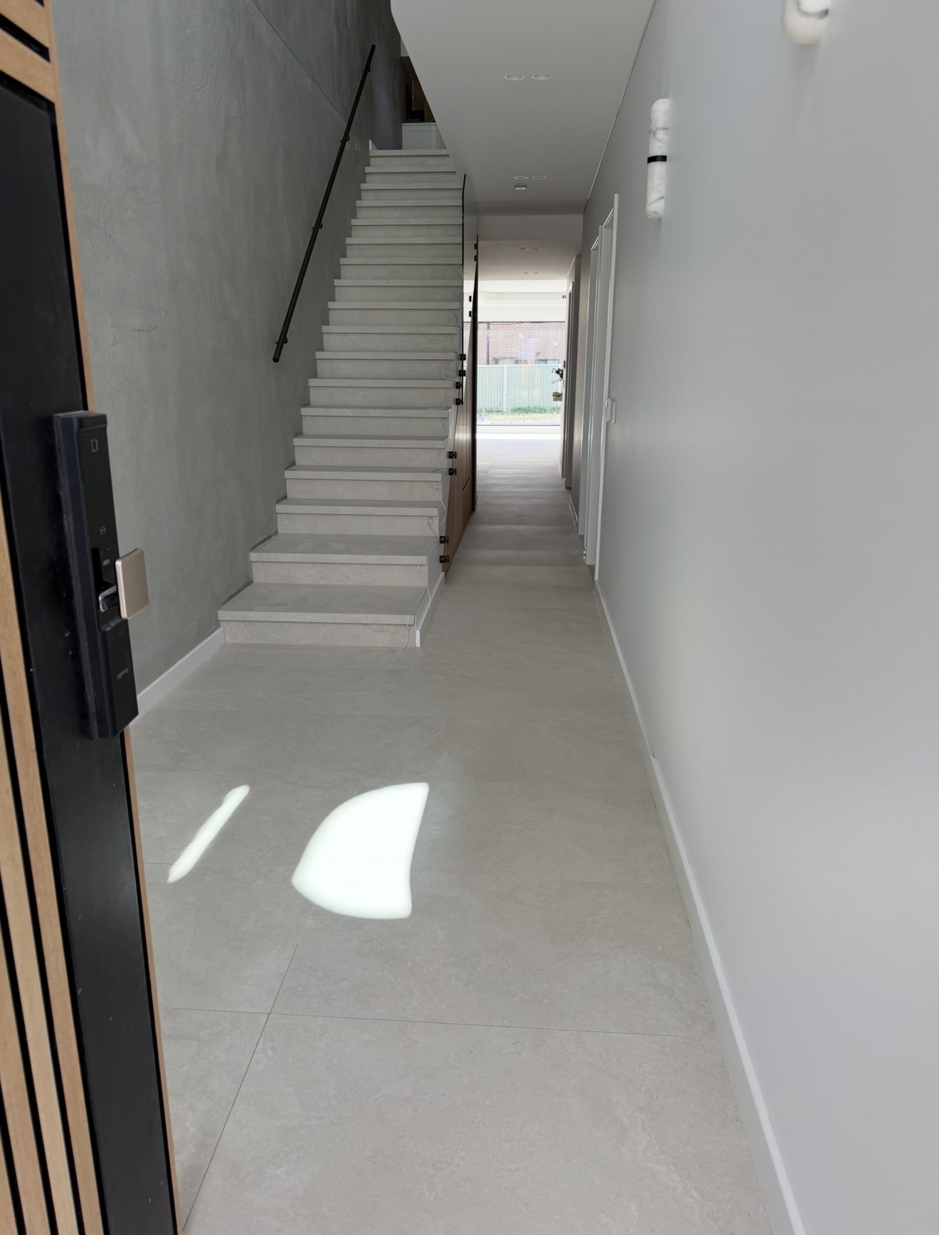 Mega Clean technician deep cleaning tiled flooring
