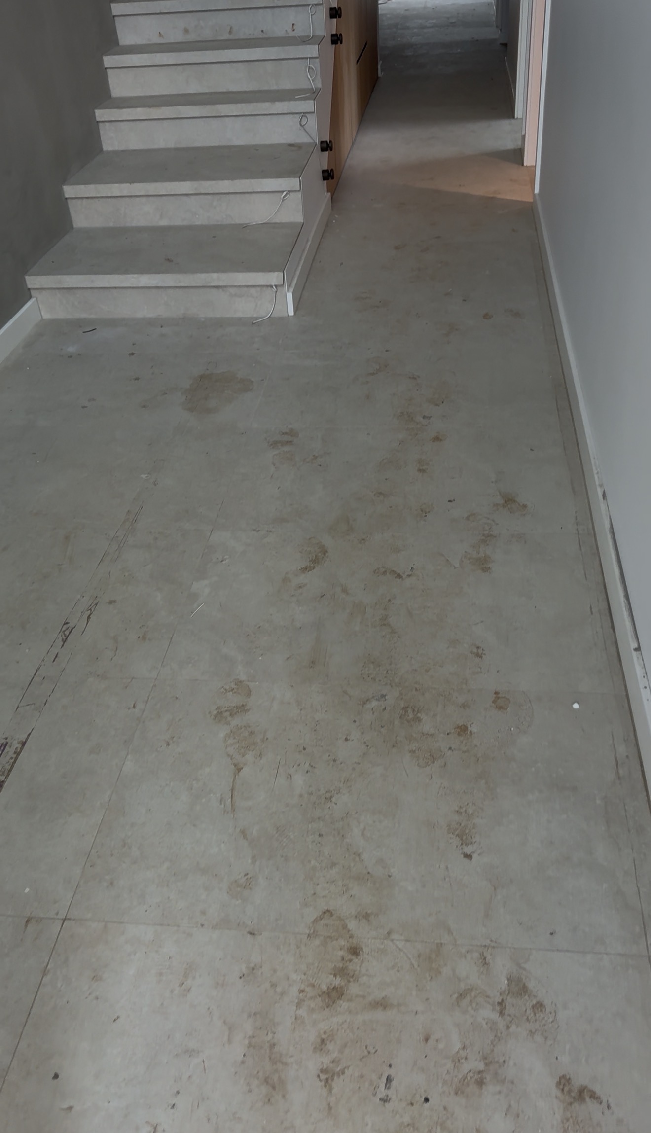 Mega Clean technician deep cleaning tiled flooring